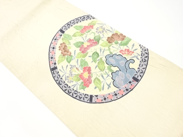 ふくれ織丸文に草花模様袋帯